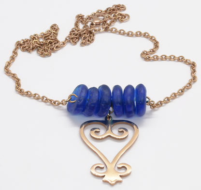 Handmade African Earrings & Adinkra Sankofa Pendant With Cobalt Blue Beads - angled shot